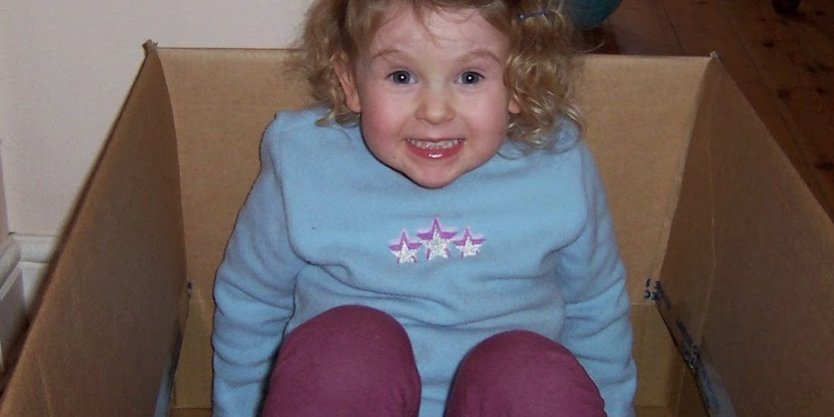 toddler in a box